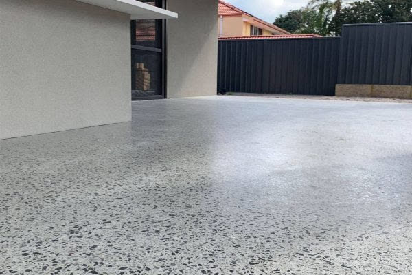 Honed concrete floor with exposed stone